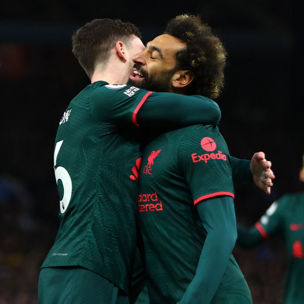 Mohamed Salah(R) and Andrew Robertson combined for Liverpool's opener in the first half vs Aston Villa.