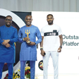 MD/CEO, PalmPay, Chika Nwosu (center), flanked by Kevin Olumese, Senior Marketing Manager, PalmPay, receiving the award of the Most Standing Payment Platform. [Palmpay]