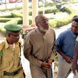 PDP spokesman, Olisa Metuh arrives Abuja court in handcuffs on January 19, 2016