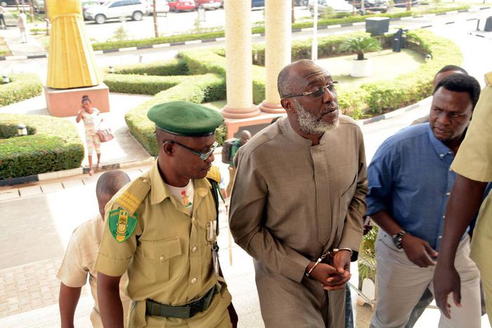 PDP spokesman, Olisa Metuh arrives Abuja court in handcuffs on January 19, 2016