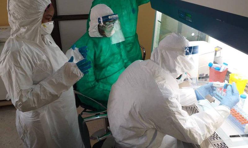 Lab technicians testing for the coronavirus disease (COVID-19) [NCDC]