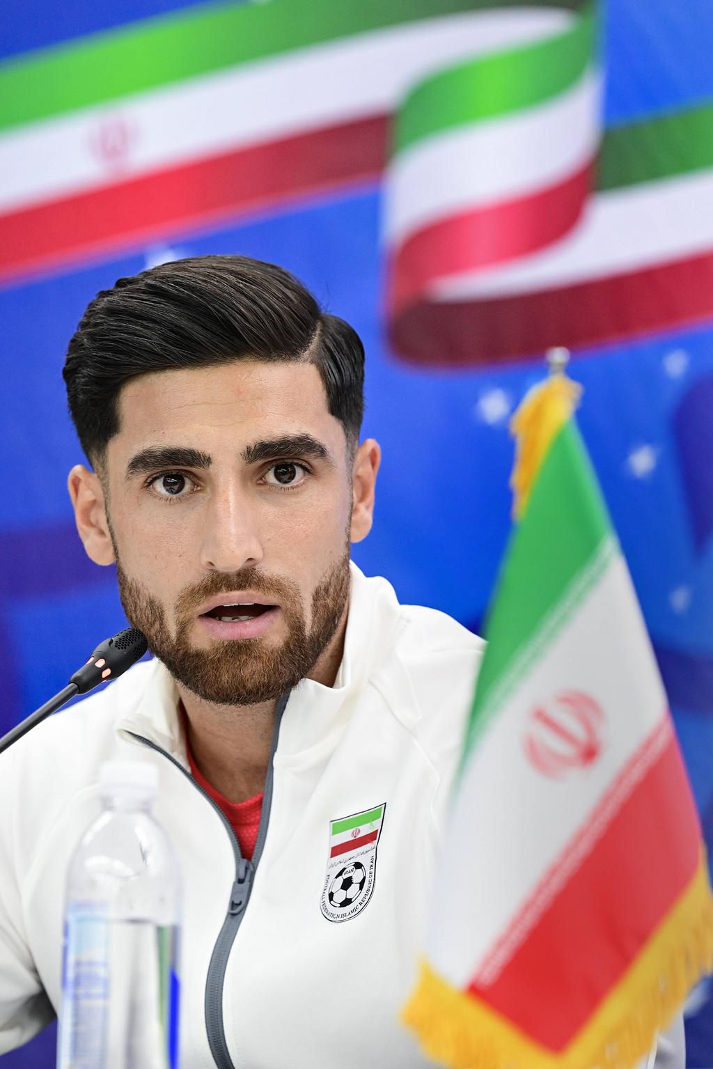 Alireza Jahanbakhsh at a press conference with Iran