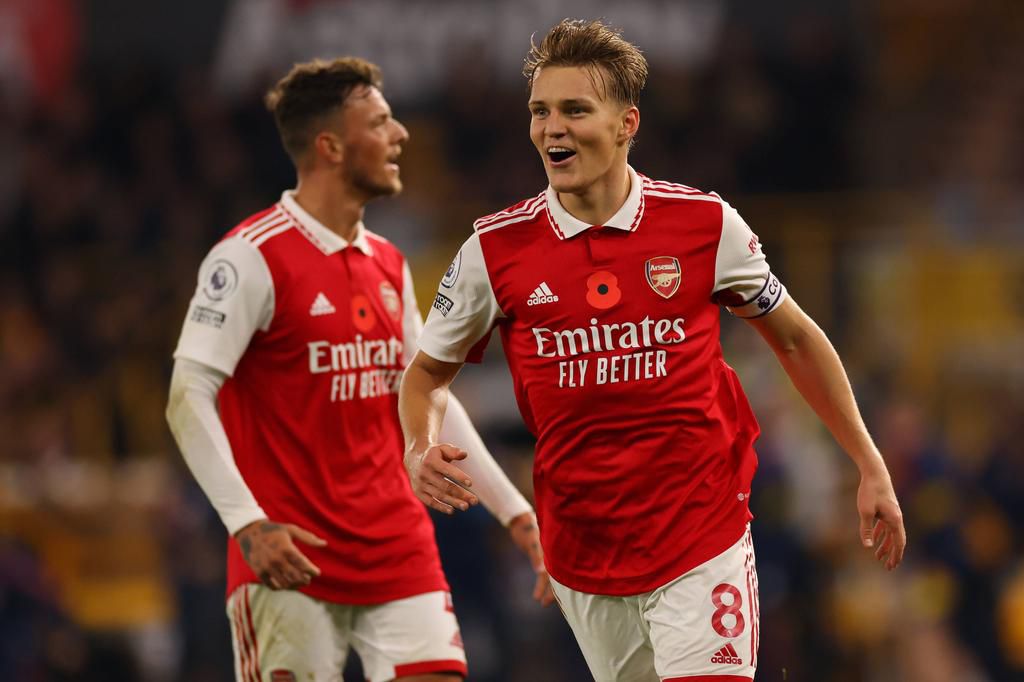Martin Ødegaard celebrating with his teammates