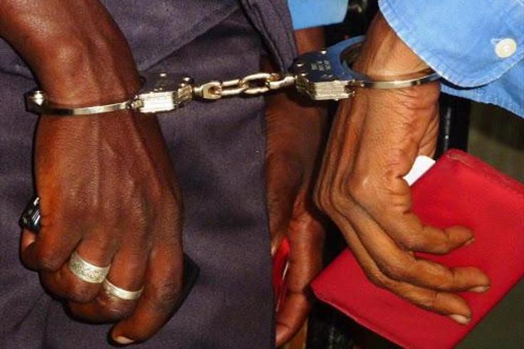 Suspects handcuffed together