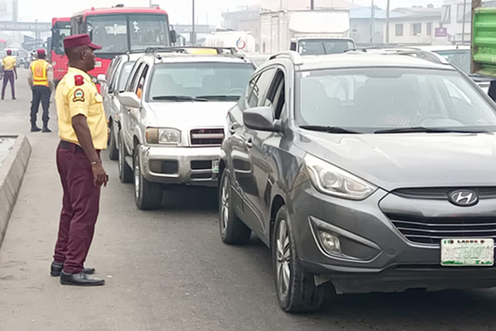 LASTMA officials in Lagos control traffic and arrest defaulting motorists. [Channels TV]