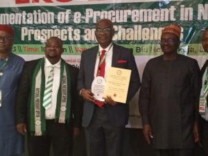 Immediate past Vice Chancellor, University of Lagos,  Prof. Oluwatoyin Ogundipe (middle) while receiving an award at the third annual national conference/induction and awards ceremony organised by APPON on Thursday in Lagos.