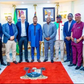 Lagos State Deputy Gov. Dr Obafemi Hamzat (middle) officials of CAF and officials of the state government. [NAN]