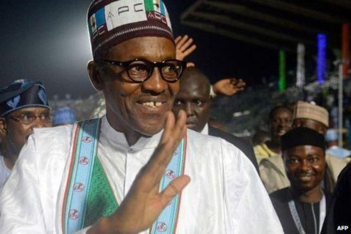 Incoming president Muhammadu Buhari, waving to supporters.