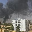 Smoke billows above residential buildings in Khartoum on as fighting in Sudan raged for a second day on April 16.Source: AFP/Getty Images.