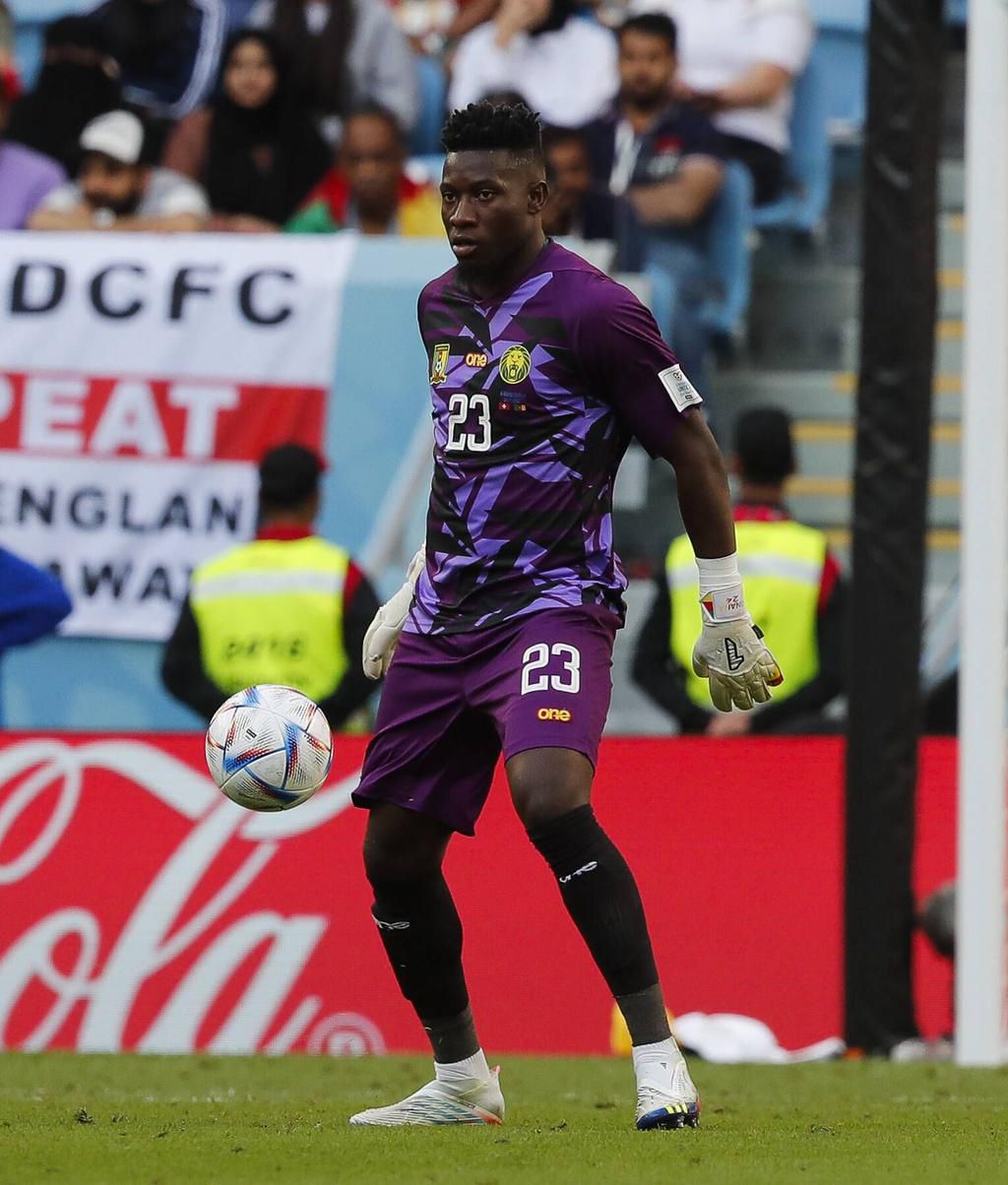 Cameroon goalkeeper Andre Onana in possession during the 2022 FIFA World Cup Group G match at Al Janoub Stadium on November 24, 2022.
