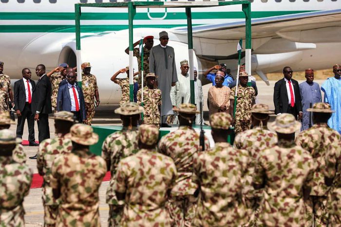 President Muhammadu Buhari with the troops of the Nigerian Army fighting Boko Haram terrorists in Borno [Prof Zulum]