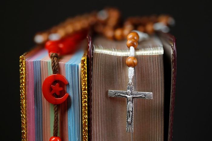 Quran and Bible (Shutterstock)