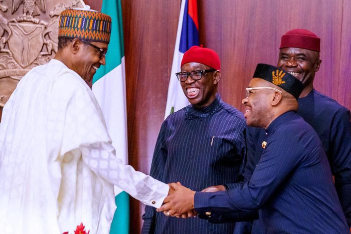 President Muhammadu Buhari with Governors of Akwa Ibom state, Emmanuel Udom and Delta state's, Patrick Okowa. [Twitter/@BashirAhmaad]