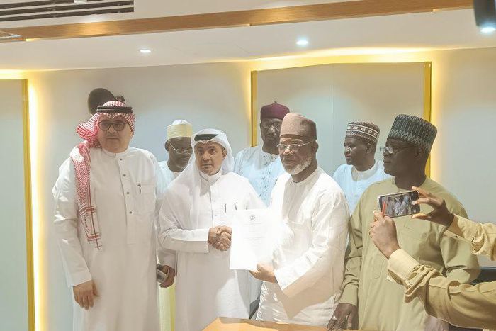 NAHCON boss, Zikrullah Hassan with officials of Flynas after signing agreement.