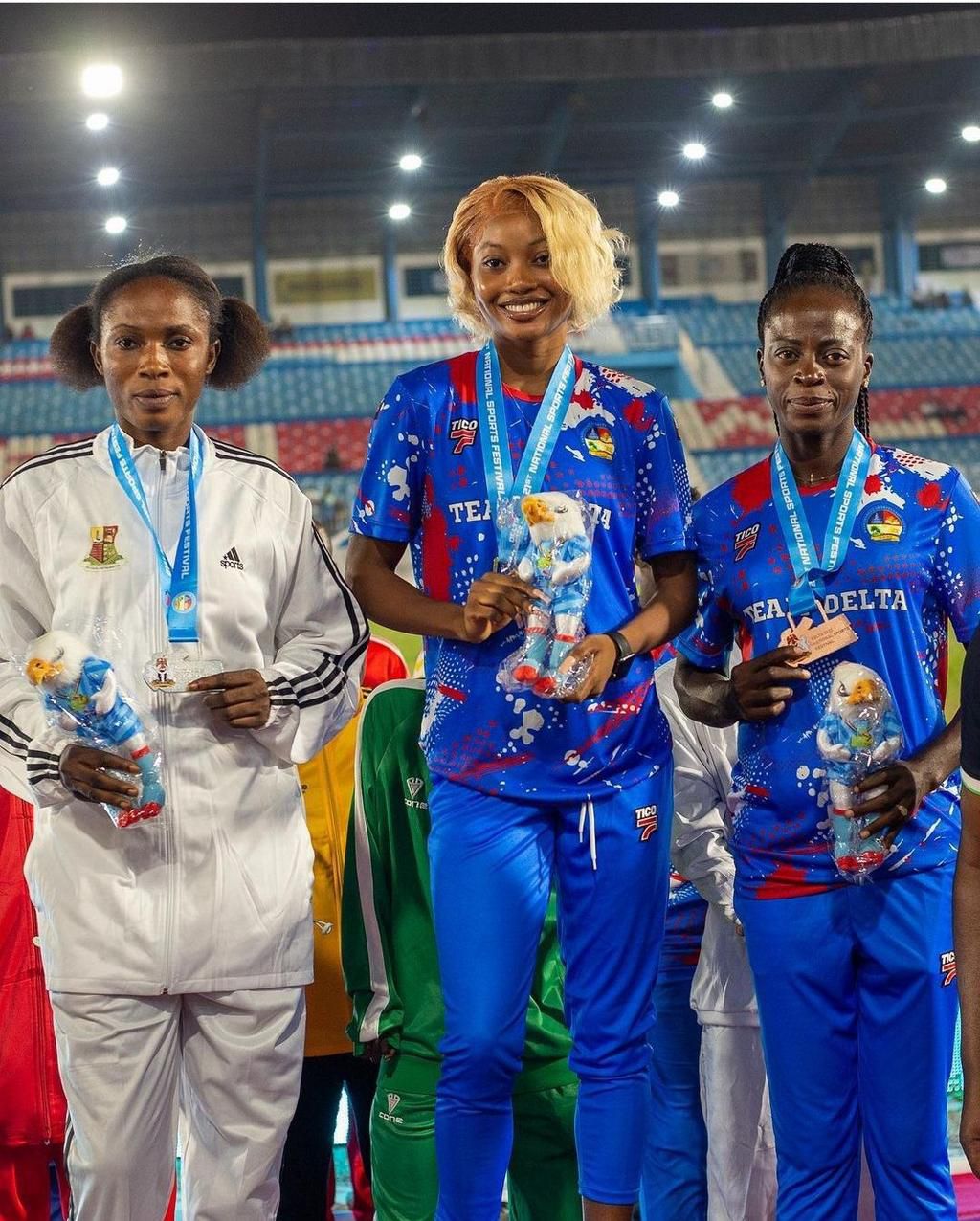 Stella Ayanleke on the podium after winning the National Sports Festival 100mH title