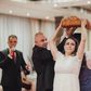 Bread breaking tradition in Bulgarian wedding [Lee Ann Belter]