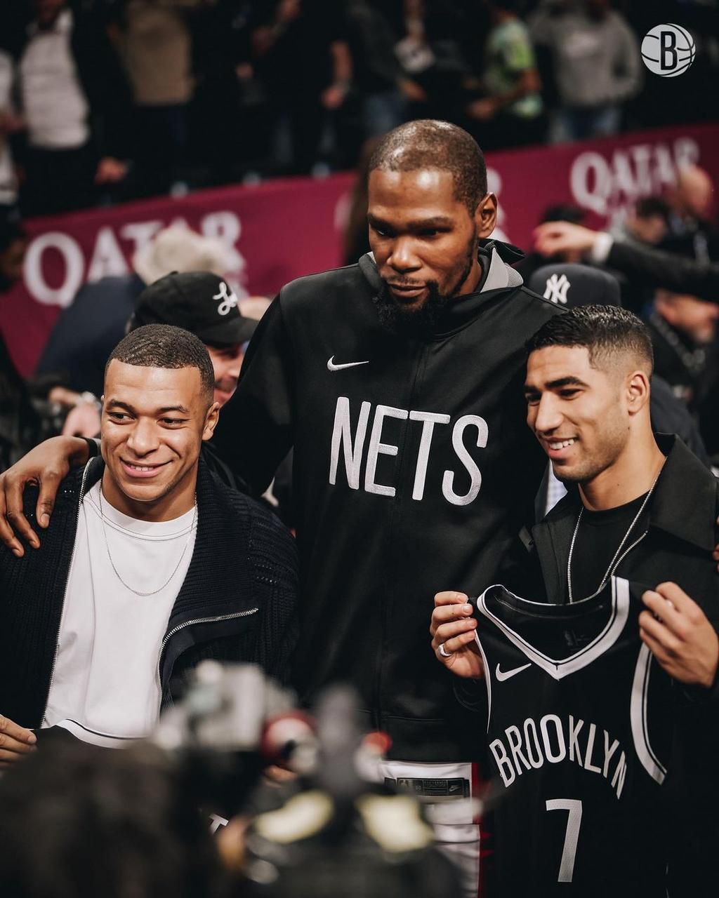Mbappe embraced Durant and was given a Brooklyn Nets jersey as they posed for pictures with Hakimi.