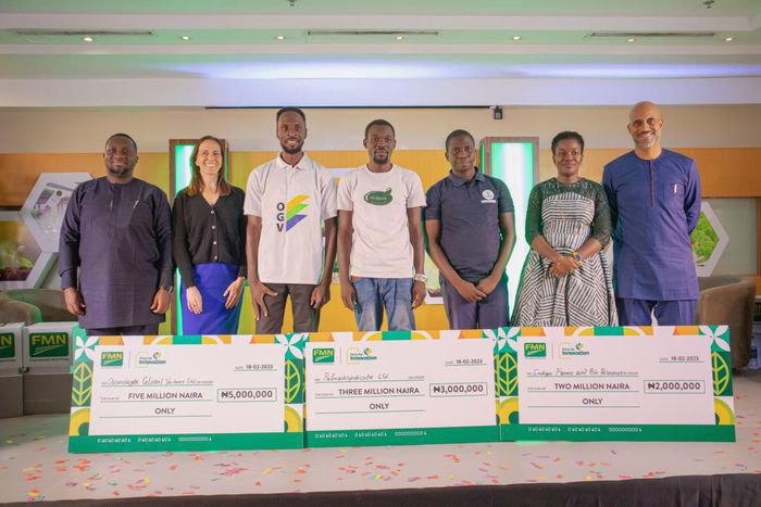 L-R: Sadiq Usman, Director – Group Strategy and Stakeholder Relations at Flour Mills of Nigeria, Mira Mehta Founder and CEO of Tomato Jos Farming and Processing Limited, PFI 2.0 Winner, Eugene Olumese Osomobegbe of Osomobegbe Global Ventures Limited, F...