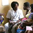 A care giver discussing with mothers during family planning training (UN)