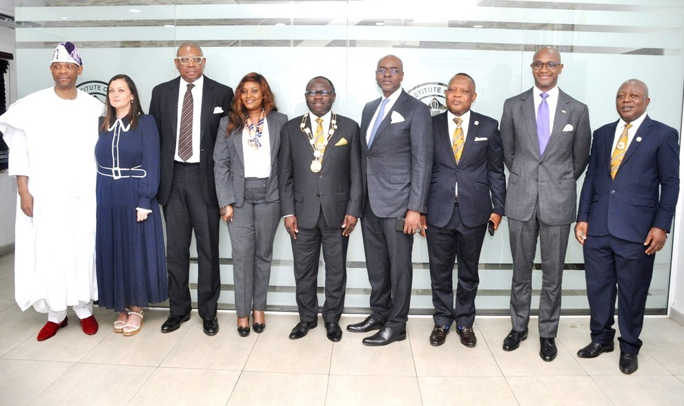 From left: Mr. Gboyega Balogun; his wife, Emma; Mr. Jide Balogun; Second Vice President, Chartered Institute of Stockbrokers (CIS), Mrs. Fiona Ahimie; President of CIS, Mr. Oluwole Adeosun; Mr. Bolaji Balogun; First Vice President, CIS, Mr. Oluropo Dad...