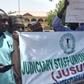 Gbenga Eludire, Chairman of the Judiciary Staff Union of Nigeria (JUSUN) Osun Chapter, voiced the workers' grievances, announcing a suspension of all services until further notice [Niche NG]