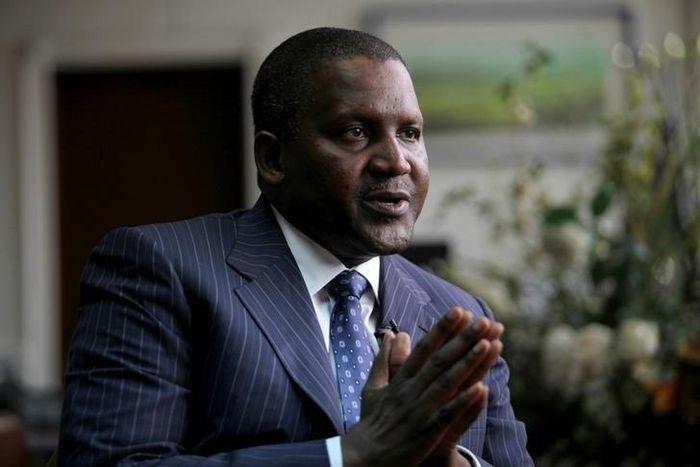 Founder and Chief Executive of the Dangote Group Aliko Dangote gestures during an interview with Reuters in his office in Lagos, Nigeria, June 13, 2012.     REUTERS/Akintunde Akinleye/File Photo