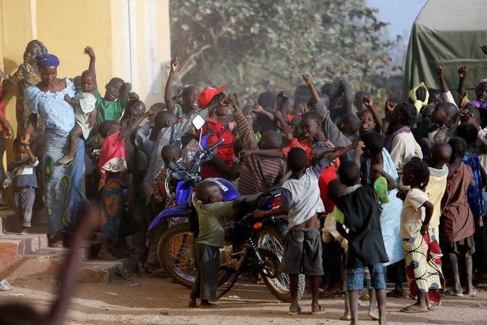 Children displaced as a result of Boko Haram attacks in the northeast region of Nigeria, cheer at a camp for internally displaced persons (IDP) in Yola, Adamawa State January 13, 2015.