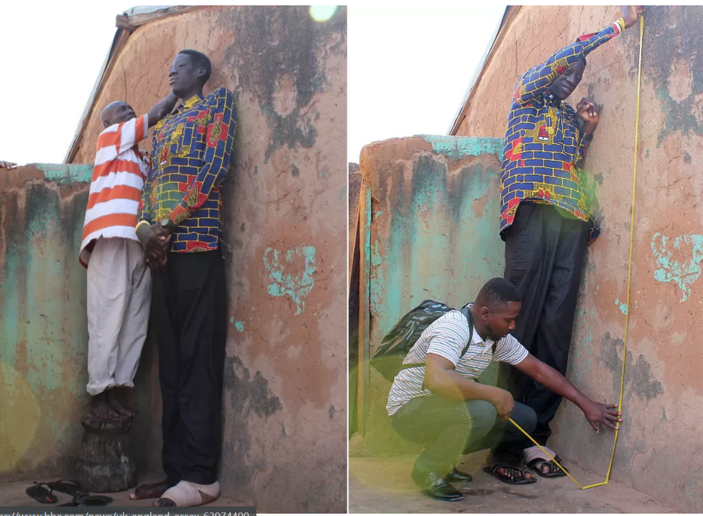 A neighbour stood on a stool to mark the wall when measuring Awuche