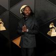 Asake attends the 66th GRAMMY Awards at Crypto.com Arena on February 04, 2024 in Los Angeles, California. (Photo by Kayla Oaddams/WireImage)