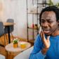 Man complaining of a tooth ache