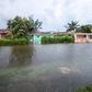 Houses line a flooded street after the effects of Hurricane Dorian arrived in Nassau, Bahamas.John Marc Nutt / Reuters