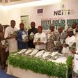 Dr Maurice Mbaeri, Permanent Secretary, General Services Office, SGF (5th left), Dr Orji Ogbonnaya Orji, Executive Secretary NEITI (5th right) with National assembly members CSOs, development partners at the unveiling of 2021 solid minerals reports in ...