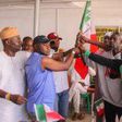 Leaders of the APC defectors to PDP receiving party’s flags at Liberty House, Ikeja on Tuesday.