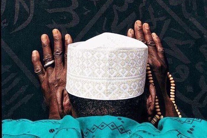 Muslim man in prayer/Courtesy