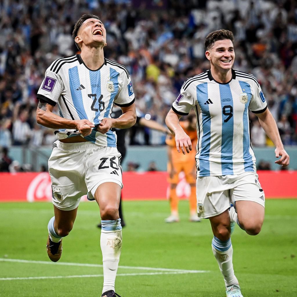 Nahuel Molina (L) celebrates the opener and his first goal for Argentina.