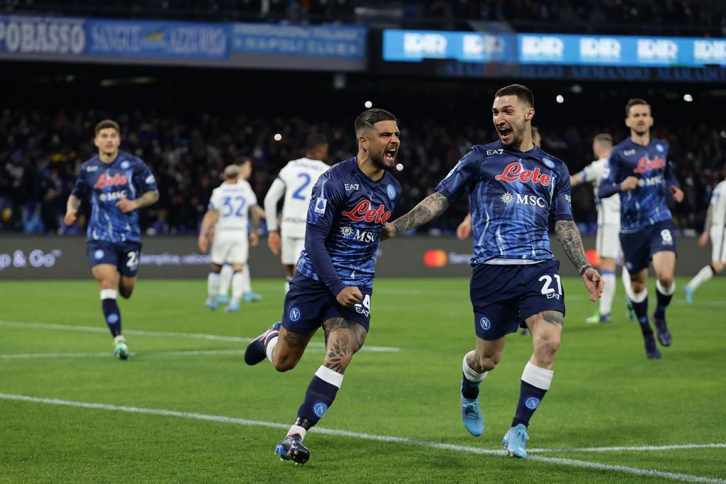 Napoli players celebrating a goal together