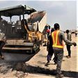 Construction workers handling the Lokoja-Benin highway project. [autojosh]