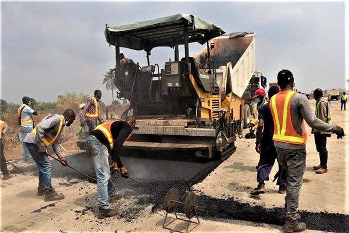 Construction workers handling the Lokoja-Benin highway project. [autojosh]