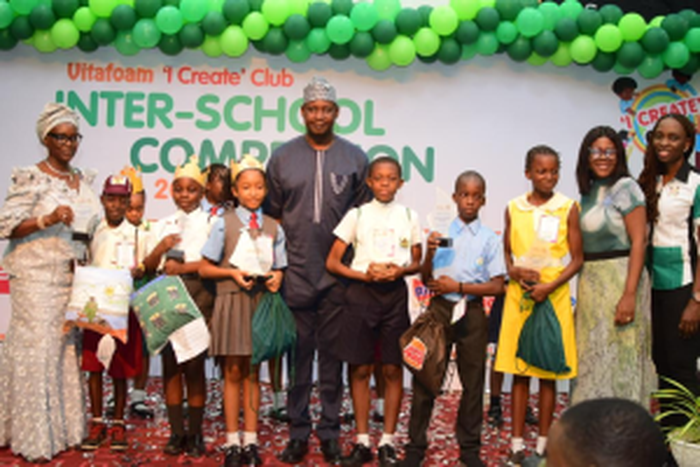 L-R: Permanent Secretary (Rtd) Ministry of the Environment and Water Resources, Lagos State , Mrs Belinda Odeneye; Korede Obadimu, State Primary School, Mangoro; Daniel Taiwo, Peaceville School; Jessica Chinaka, Kayron International School; Group Manag...
