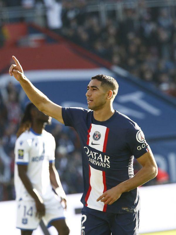 Achraf Hakimi celebrates scoring PSG’s third goal against Auxerre