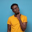 Black man thinking [Adobe Stock]