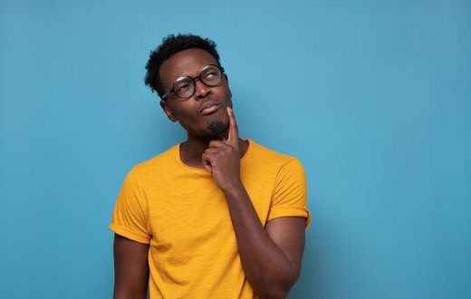 Black man thinking [Adobe Stock]