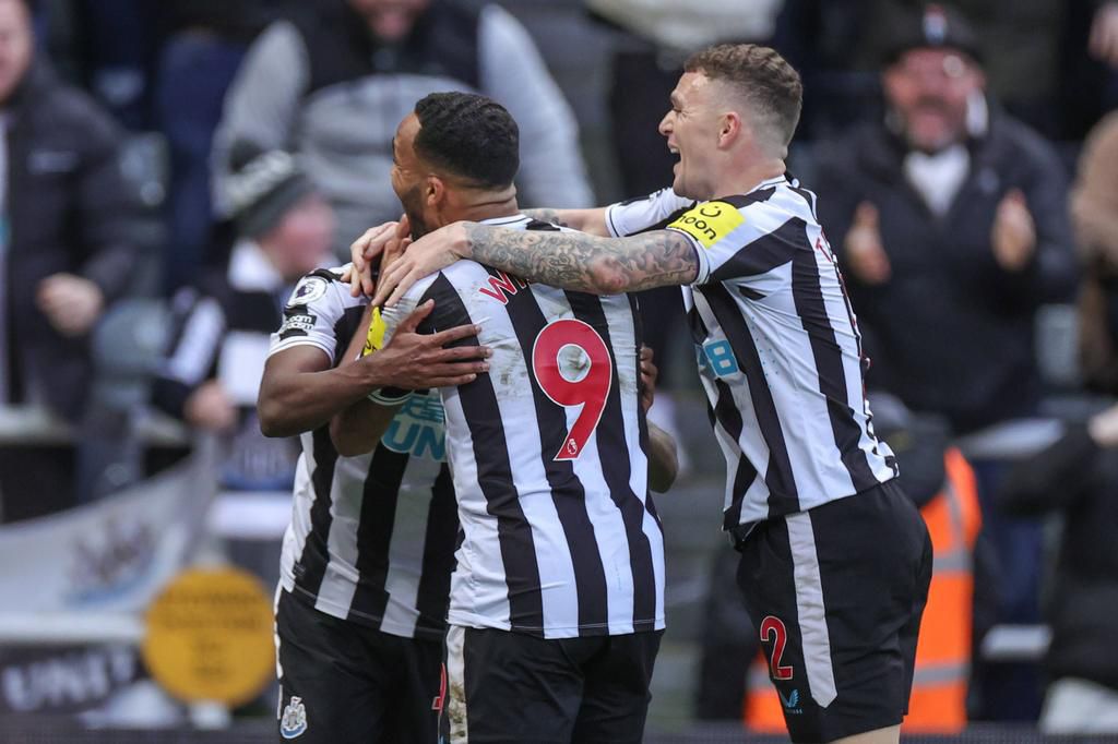 Newcastle United players celebrating a goal