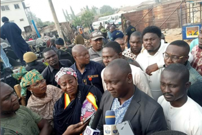 An illustrative photo of the Honourable Commissioner, Ministry Of Internal Security And Home Affairs Mr Samuel Aruwan and the Executive Secretary Kaduna state emergency agency and other humanitarian agency at the site of a gas explosion. [dailytimes]