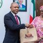 Gov. Peter Mbah of Enugu State receiving a souvenir from the NTA Enugu Zonal Director (Credit: NAN)