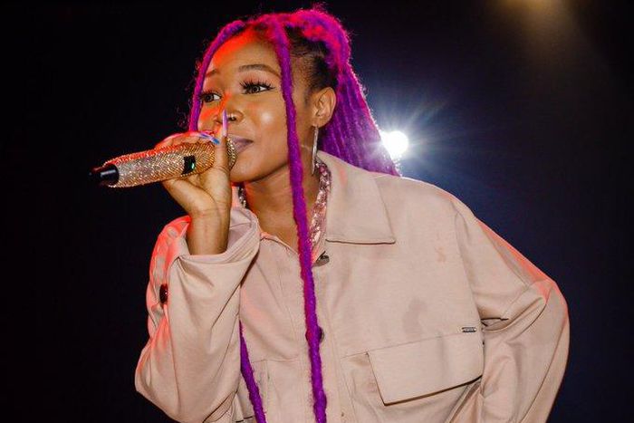 Musician Guchi performing in a concert