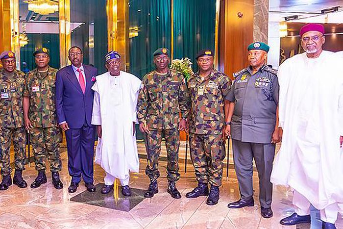 President Bola Tinubu (centre) with Nigeria’s outgoing service chiefs and heads of intelligence agencies at the State House in Abuja on June 1, 2023. [Presidency]
