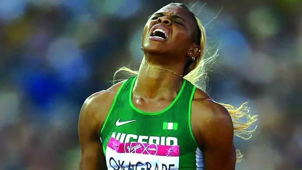 Blessing Okagbare victory celebration after winning the double sprints Commonwealth title