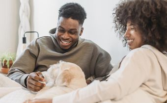 A couple smiling