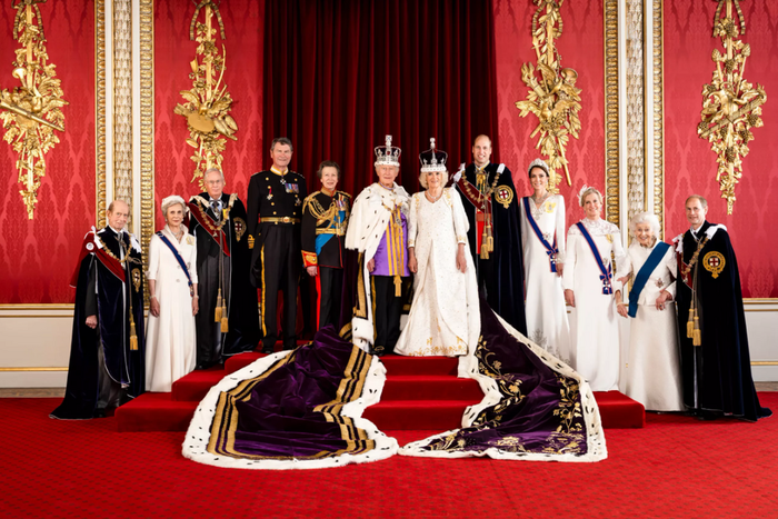 King Charles marks coronation with photograph of himself with heirs.